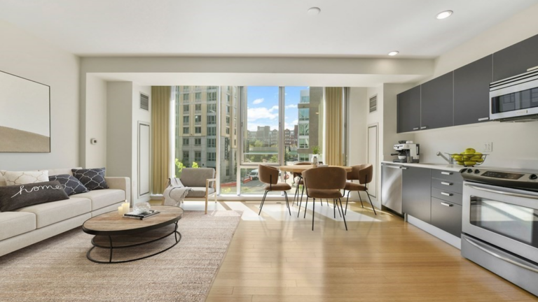 Large living room with wood floors.