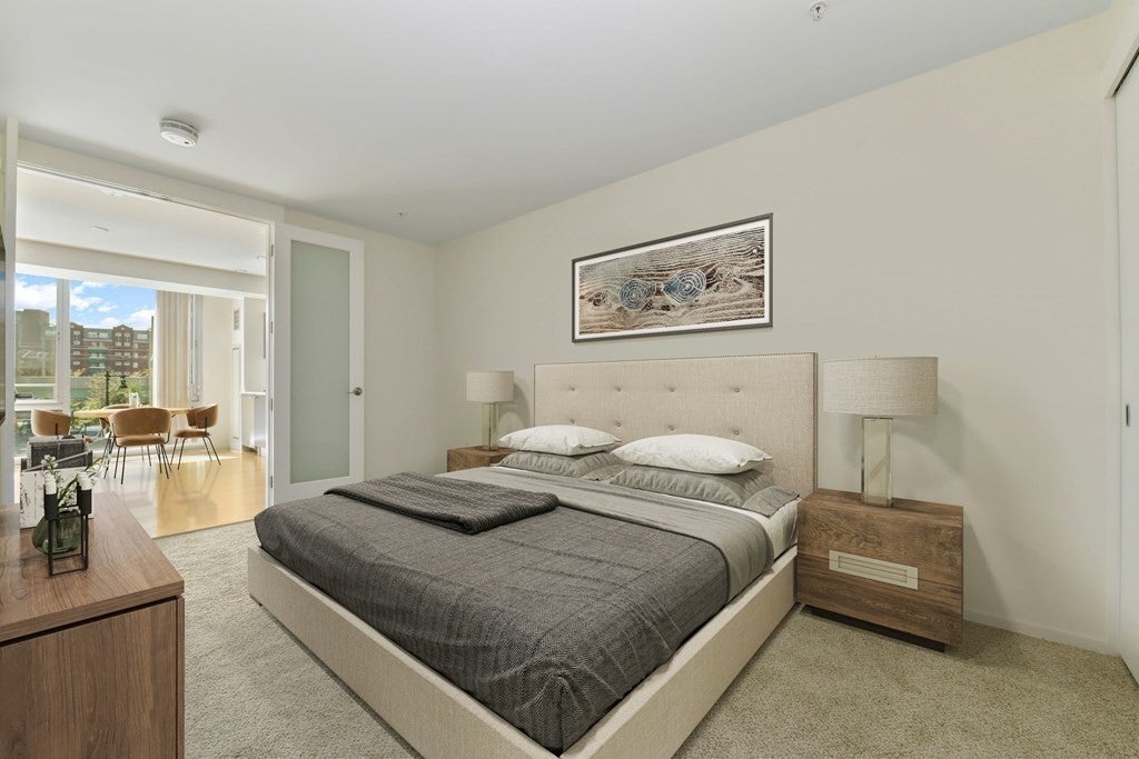 Bedroom in Cambridge apartment with carpeting. 