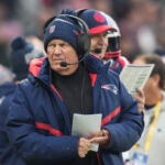 New England Patriots head coach Bill Belichick watches from the sideline in the first half of an NFL football game against the Indianapolis Colts in Frankfurt, Germany Sunday, Nov. 12, 2023.