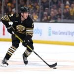 BOSTON, MASSACHUSETTS - NOVEMBER 09: Mason Lohrei #6 of the Boston Bruins skates against the New York Islanders during the first period at TD Garden on November 09, 2023 in Boston, Massachusetts.