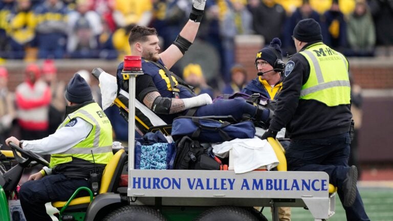 Michigan standout Zak Zinter of North Andover breaks tibia, fibula