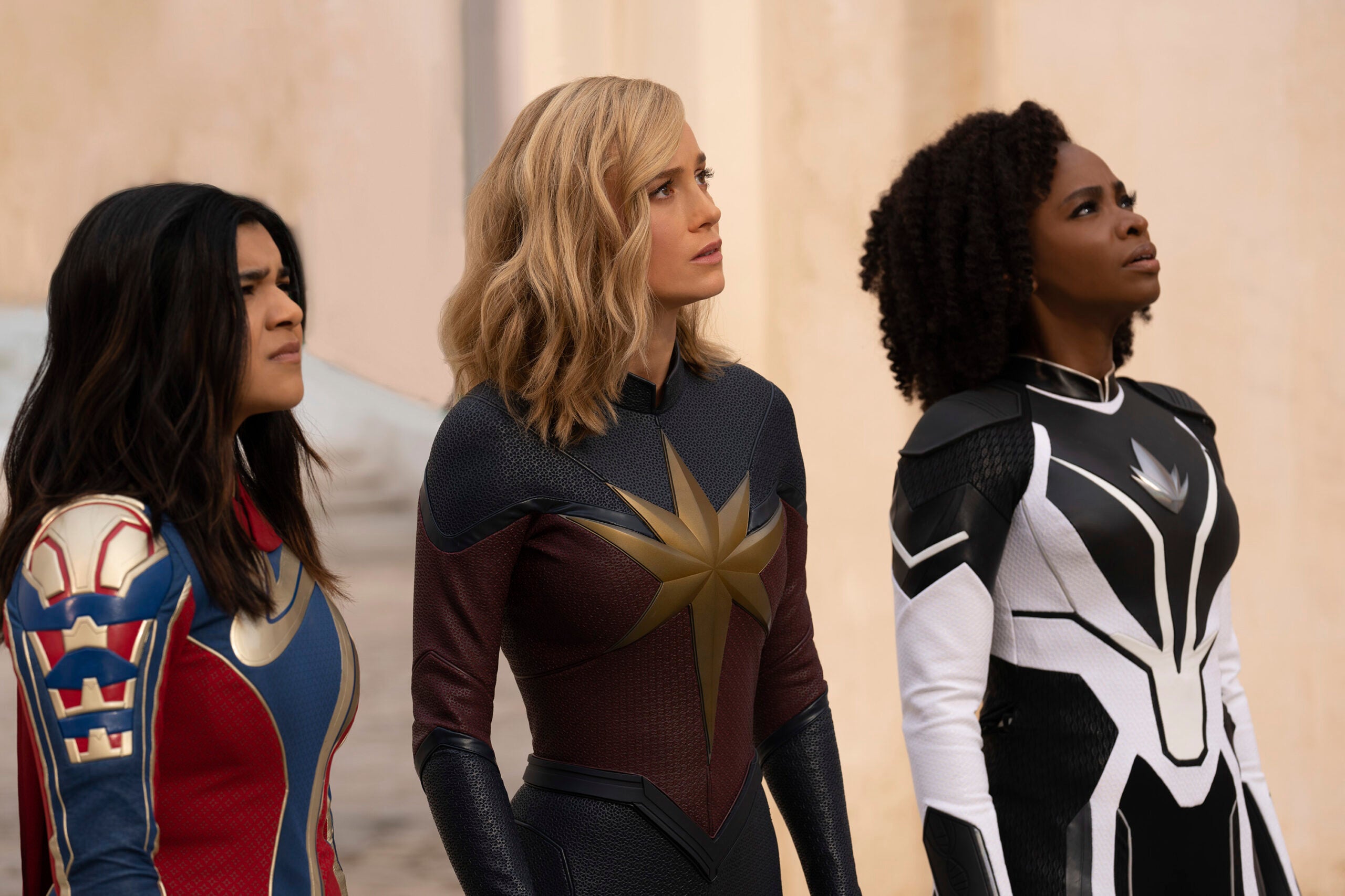 This image released by Disney shows, from left, Iman Vellani as Ms. Marvel, Brie Larson as Captain Marvel, and Teyonah Parris as Captain Monica Rambeau in a scene from "The Marvels."