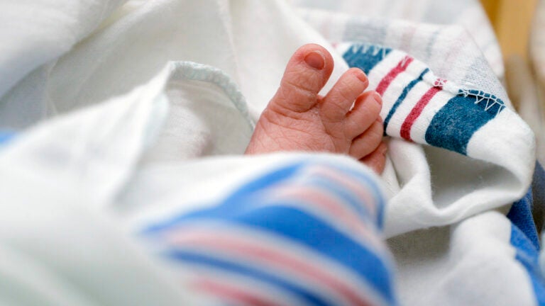 The toes of a baby peek out of a blanket at a hospital in McAllen, Texas.