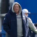 New England Patriots head coach Bill Belichick walks on the field during an NFL football practice, Wednesday, Nov. 15, 2023, in Foxborough, Mass.