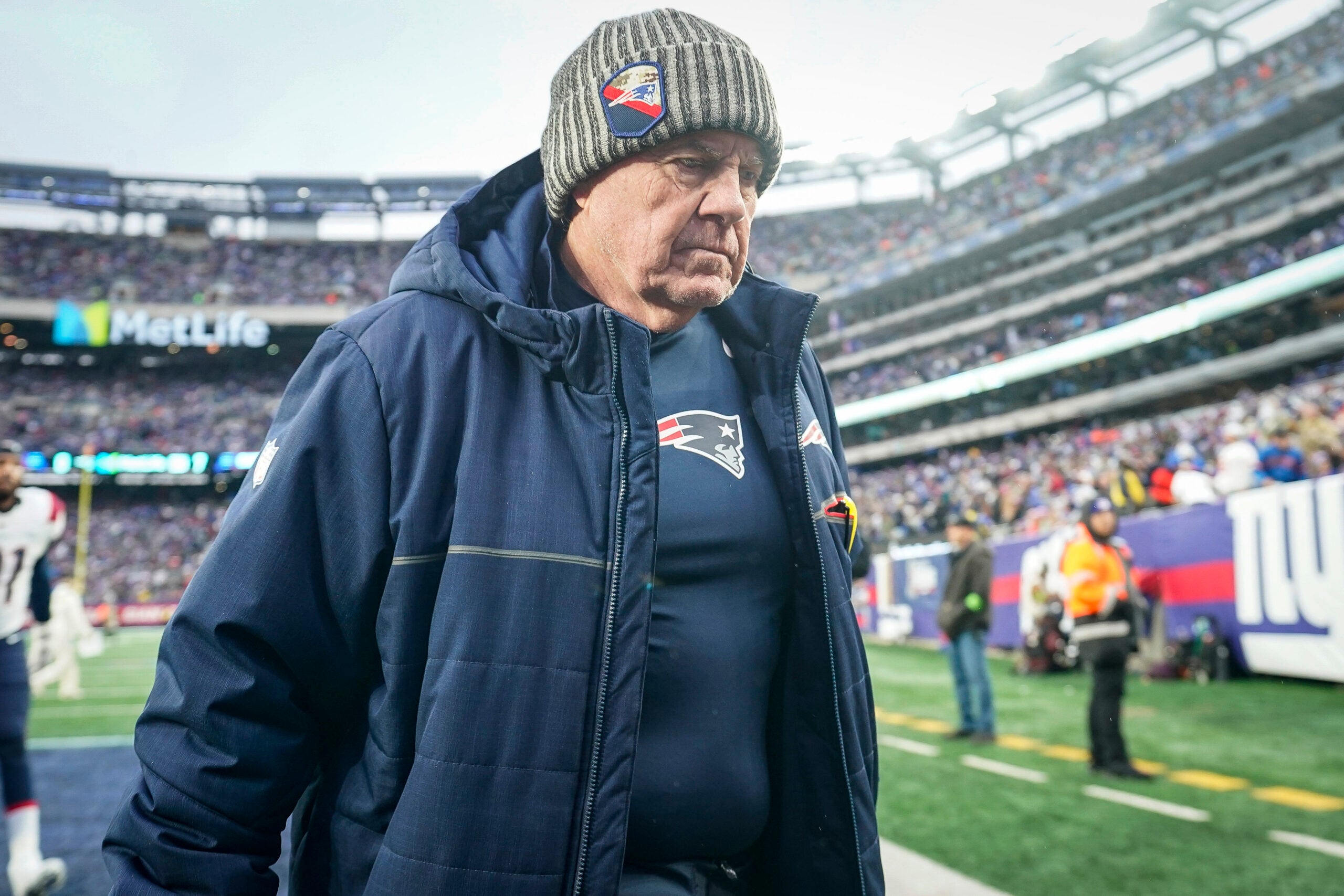 New England Patriots Bill Belichick walks off the field during an NFL football game against the New York Giants, Friday, Nov. 26, 2023, in East Rutherford, N.J.