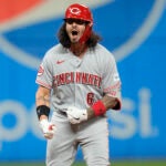 Cincinnati Reds' Jonathan India celebrates his double against the Cleveland Guardians during the sixth inning of a baseball game Wednesday, Sept. 27, 2023, in Cleveland.