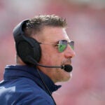 Tennessee Titans head coach Mike Vrabel looks onto the field from the sideline during the first half of an NFL football game against the Tampa Bay Buccaneers, Sunday, Nov. 12, 2023, in Tampa, Fla.