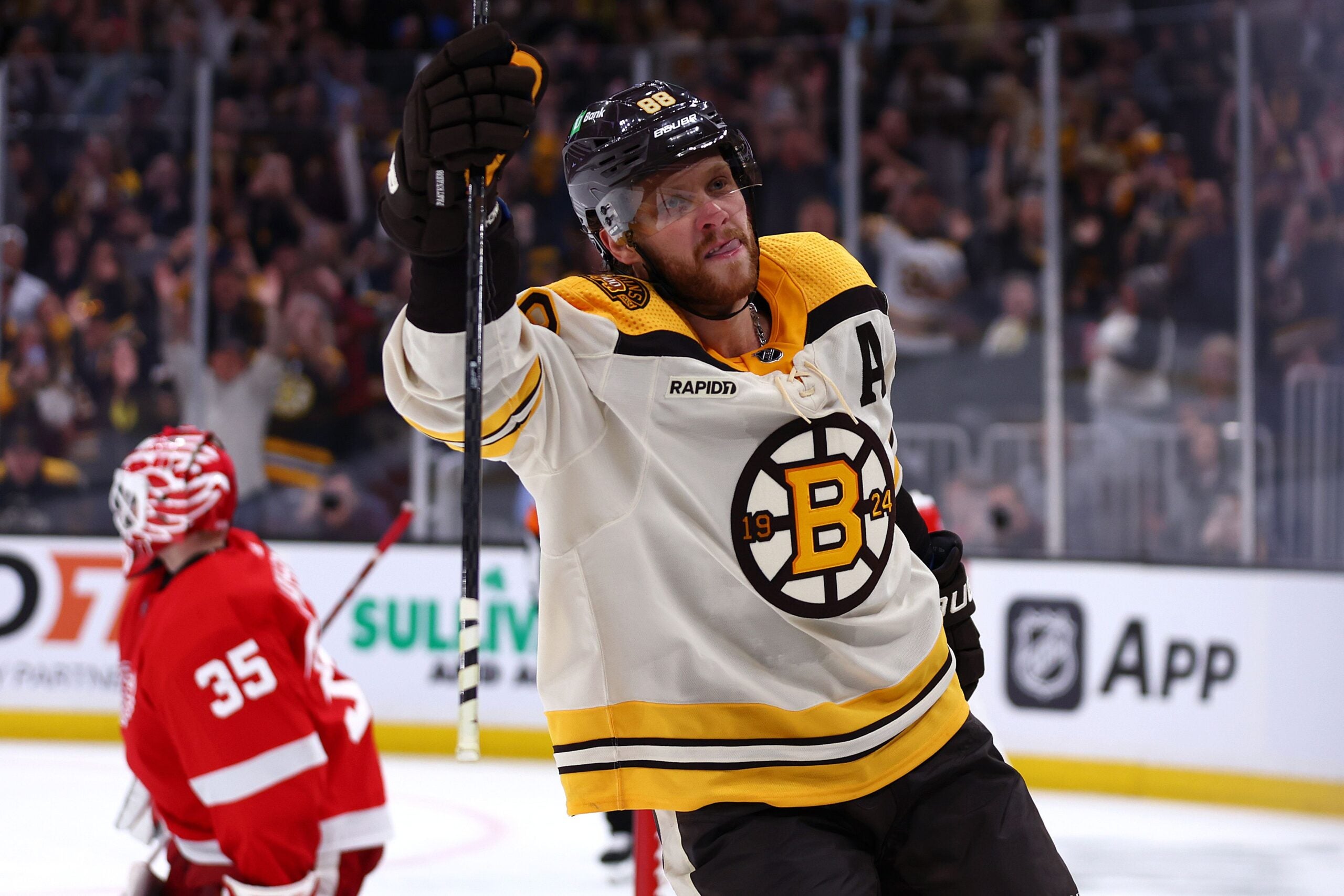 BOSTON, MASSACHUSETTS - OCTOBER 28: David Pastrnak #88 of the Boston Bruins celebrates after scoring a penalty shot awarded after he was slashed by Jake Walman #96 of the Detroit Red Wings during the third period at TD Garden on October 28, 2023 in Boston, Massachusetts. The Bruins defeat the Red Wings 4-1. (Photo by Maddie Meyer/Getty Images)