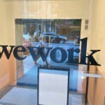 A sign for WeWork.
