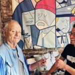 Bill Murray poses with an illustration of himself from "The Life Aquatic with Steve Zissou" at Select Oyster Bar in Boston.