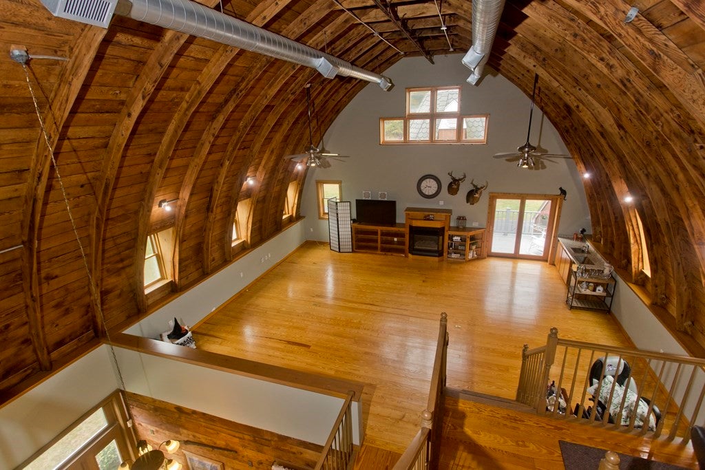 Second floor space with original barn boards and 40 foot ceilings. 