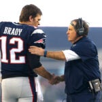 Tom Brady #12 and head coach Bill Belichick of the New England Patriots shake hands at the start of the AFC Divisional Playoff Game against the Kansas City Chiefs at Gillette Stadium on January 16, 2016 in Foxboro, Massachusetts.