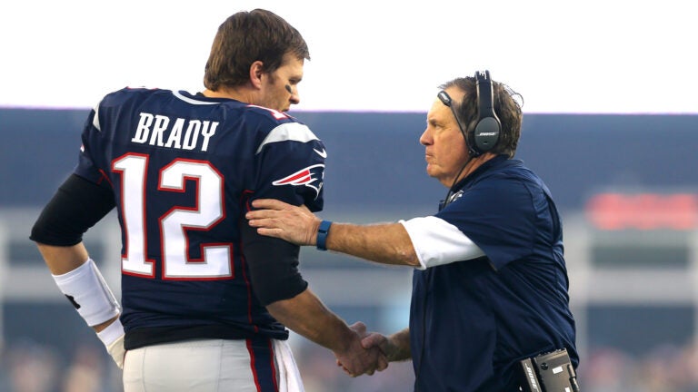 Tom Brady #12 and head coach Bill Belichick of the New England Patriots shake hands at the start of the AFC Divisional Playoff Game against the Kansas City Chiefs at Gillette Stadium on January 16, 2016 in Foxboro, Massachusetts.