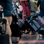 Travelers at Ronald Reagan Washington National Airport in Arlington, Va.