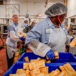 Workers at the Cabot Creamery facility in Cabot, Vt.