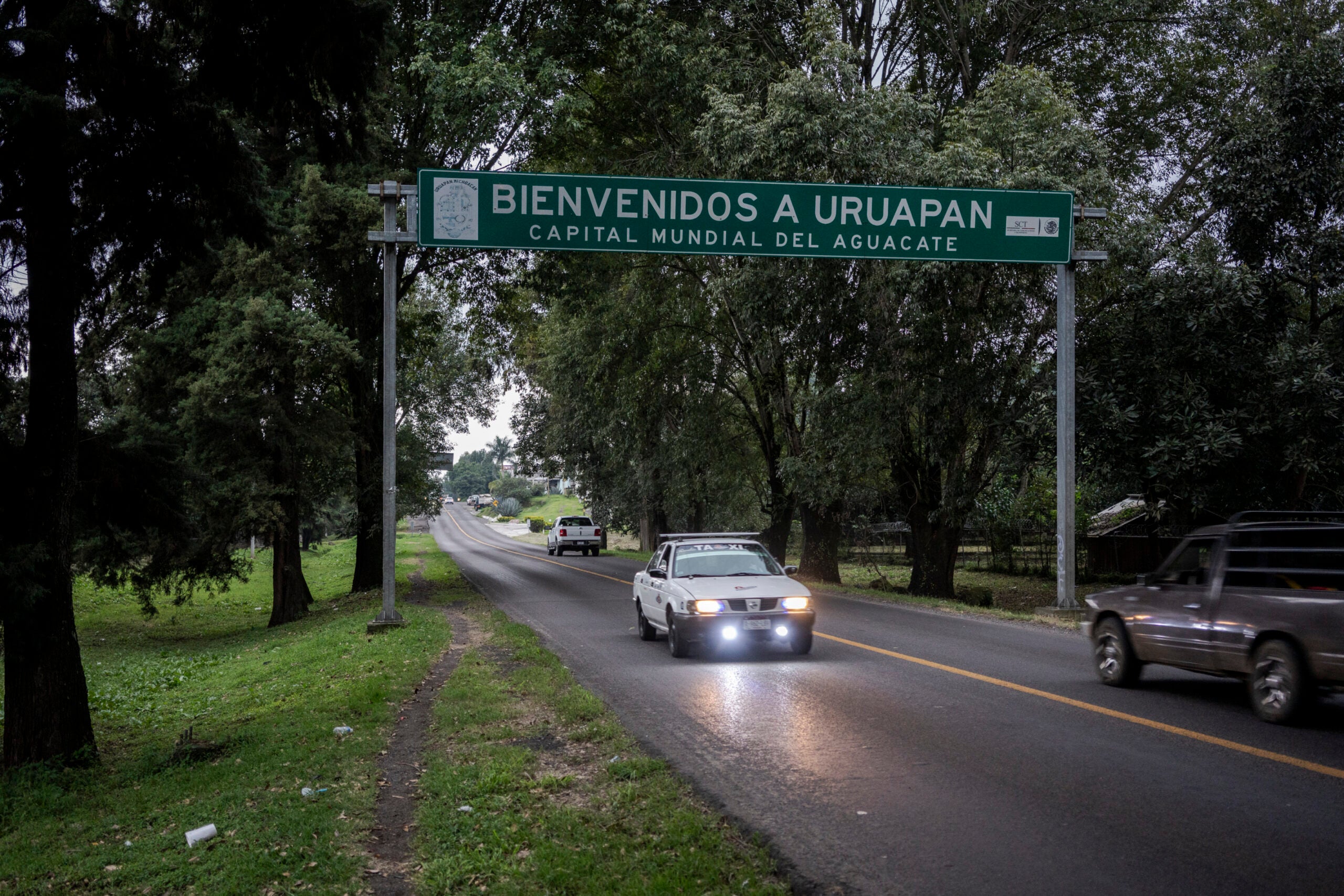 A sign reads “Welcome to Uruapan, avocado capital of the world” at the entrance to Uruapan, in the state of Michoacán, Mexico. 