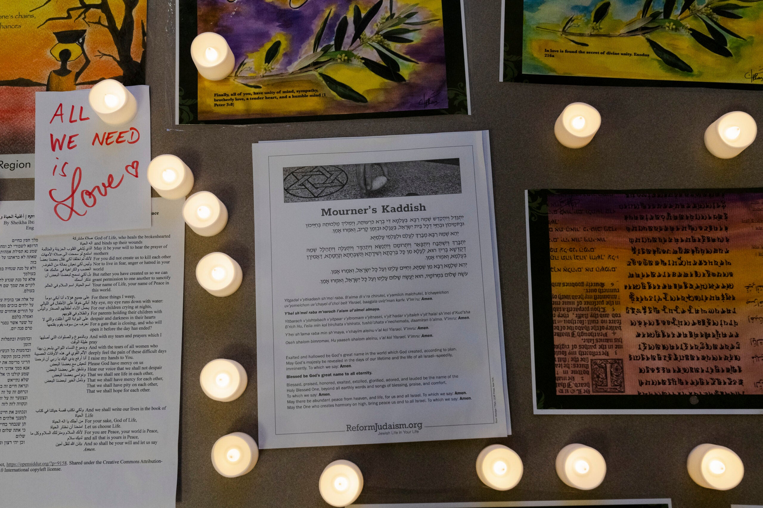 Tealights and praters at an event hosted by Standing Together at Brookline Public Library in Brookline, Mass. 