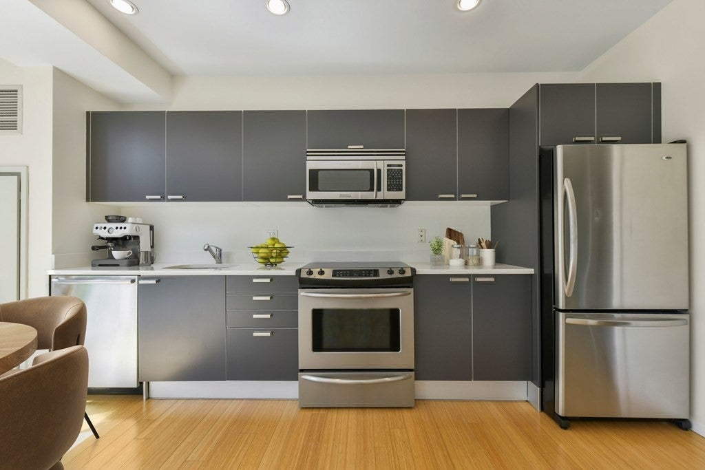 Kitchen with stainless steel appliances.