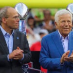 Jonathan Kraft, left and Robert Kraft duirng a half time celebration for Tom Brady’s career during their game against the Philadelphia Eagles at Gillette Stadium. 
