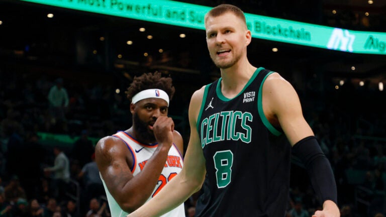 Celtics' Kristaps Porzingis downplays severity of knee injury