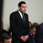 Bruins forward Milan Lucic was arraigned on a charge of assaulting his wife on Tuesday in Boston Municipal Court. He plead not guilty to assault and battery charged.