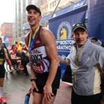 The Boston Marathon finish line-Former Bruins Zdeno Chara rests after crossing the finish line.