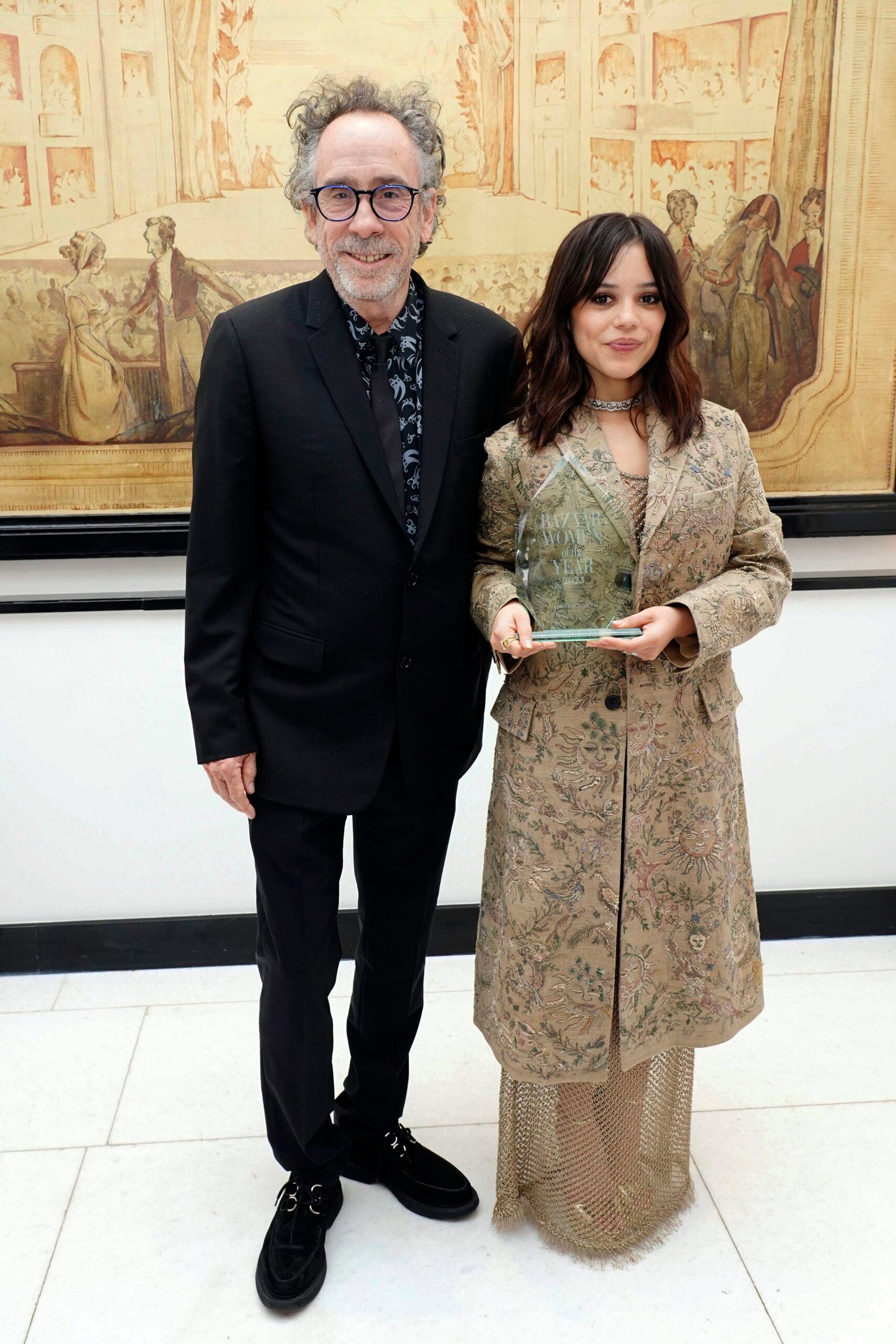 Jenna Ortega, presented by Tim Buton, with her Breakthrough Award at the Harper's Bazaar Women of the Year 2023 awards at Claridges, in London, Tuesday, Nov. 7, 2023.