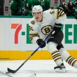 Boston Bruins center Matthew Poitras skates against the Dallas Stars during the second period of an NHL hockey game, Monday, Nov. 6, 2023, in Dallas.