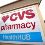 A CVS store sign is displayed in Pittsburgh.