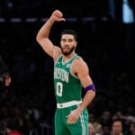 Boston Celtics forward Jayson Tatum gestures during the first half of an NBA basketball game against the Los Angeles Lakers, Monday, Dec. 25, 2023, in Los Angeles.