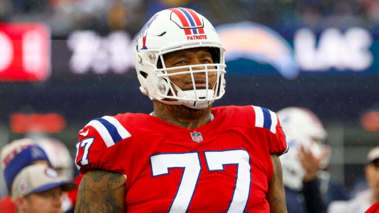 New England Patriots offensive tackle Trent Brown (77) reacts during the first half of an NFL football game against the Los Angeles Chargers on Sunday, Dec. 3, 2023, in Foxborough, Mass.
