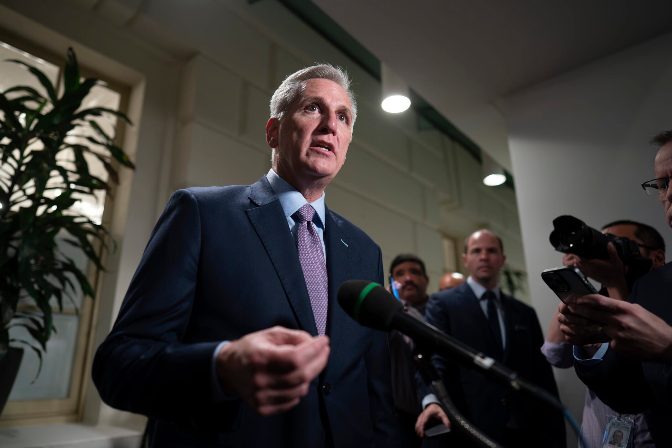 Speaker of the House Kevin McCarthy, R-Calif., talks to reporters.