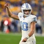 PITTSBURGH, PENNSYLVANIA - SEPTEMBER 23: Drake Maye #10 of the North Carolina Tar Heels celebrates after a North Carolina Tar Heels touchdown in the first quarter against the Pittsburgh Panthers at Acrisure Stadium on September 23, 2023 in Pittsburgh, Pennsylvania.