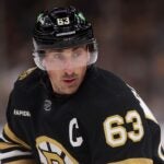 BOSTON, MASSACHUSETTS - NOVEMBER 30: Brad Marchand #63 of the Boston Bruins looks on during the second period against the San Jose Sharks at TD Garden on November 30, 2023 in Boston, Massachusetts.