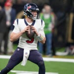 Houston Texans quarterback E.J. Perry (3) drops back to pass in the second half of an NFL preseason football game against the New Orleans Saints in New Orleans, Sunday, Aug. 27, 2023.