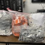 Multiple bags of more than 4,617 gift cards.