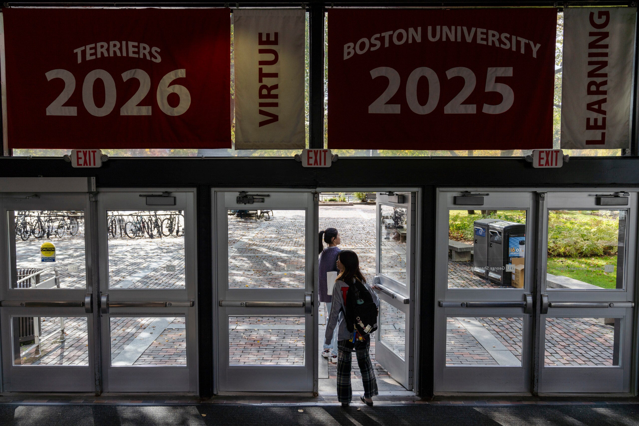 People leave the George Sherman Union at Boston University in Boston.