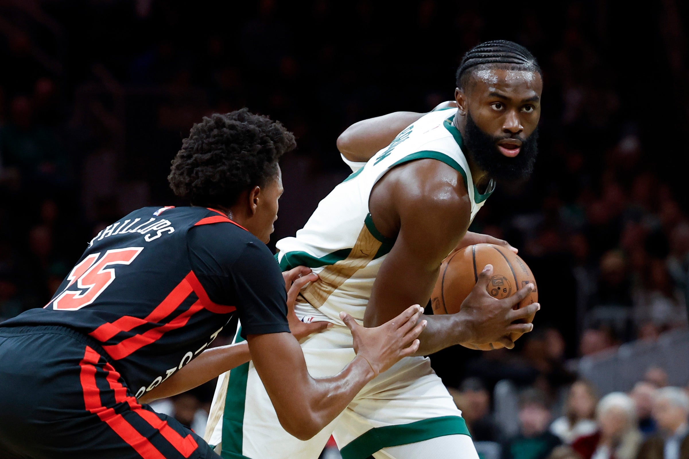 Boston Celtics guard Jaylen Brown (7) plays against Chicago Bulls forward Julian Phillips (15) in the second half. The Celtics defeat the Bulls, 124-97, at TD Garden.