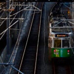 A Green Line trolley on the tracks.