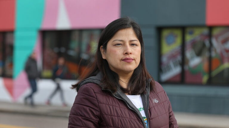 Mabell Acevedo participated in Cambridge’s RISE program, that gives her a monthly cash stipend, with no strings attached. She is photographed in Central Square.