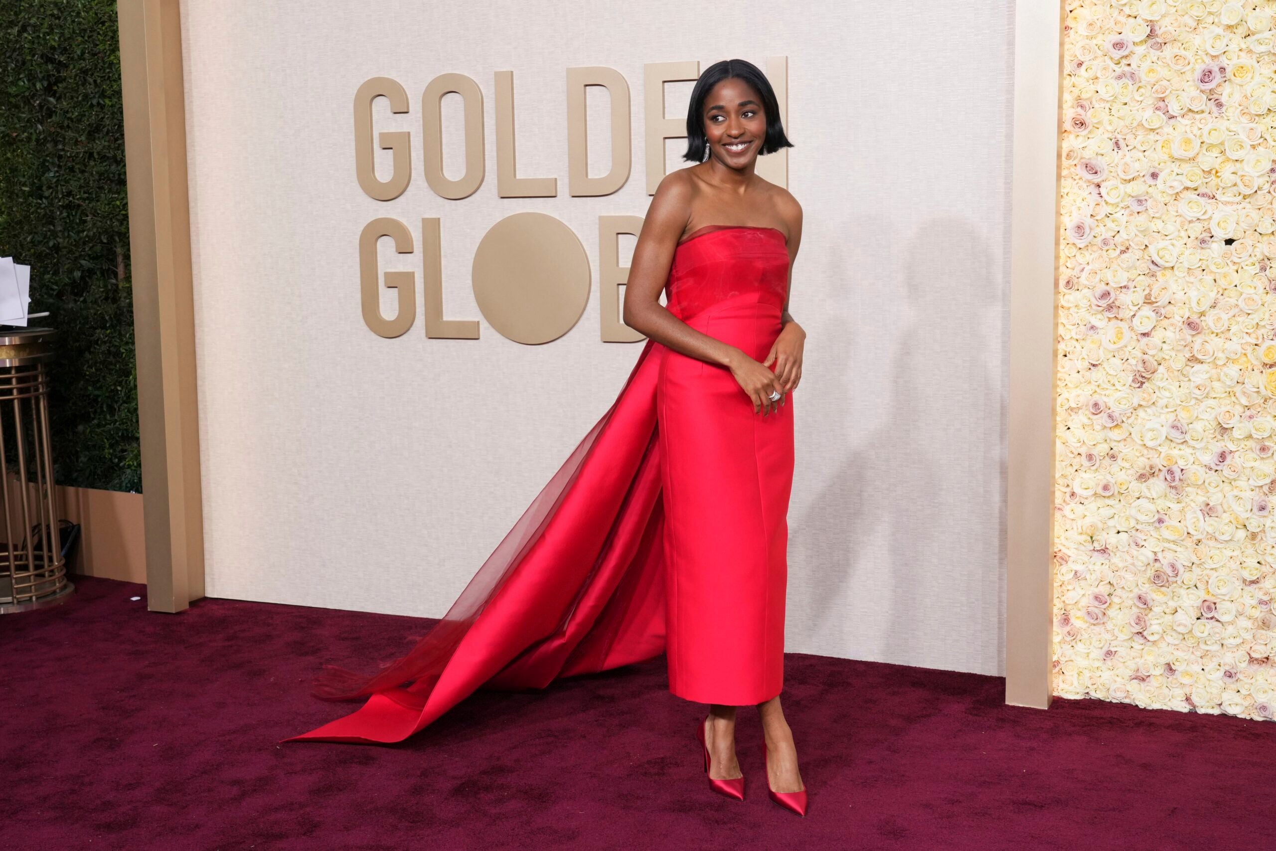 Ayo Edebiri arrives on the 2024 Golden Globes red carpet.