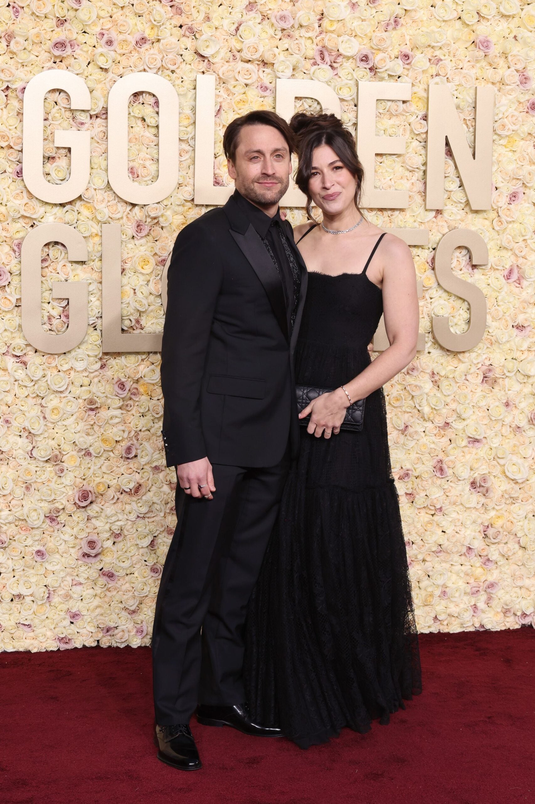 Kieran Culkin and Jazz Charton arrive at the 2024 Golden Globes red carpet.