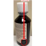 The location of a lot number of recalled Robitussin cough syrup.