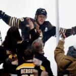 Boston Bruins' David Pastrnak celebrates after scoring against the New Jersey Devils for the second time in the second period of an NHL hockey game Saturday, Dec. 30, 2023, in Boston.
