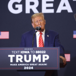 Republican presidential candidate former President Donald Trump speaks to guests during a rally at Clinton Middle School on January 06, 2024 in Clinton, Iowa.