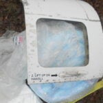 The door of a plane found in a yard in New Hampshire