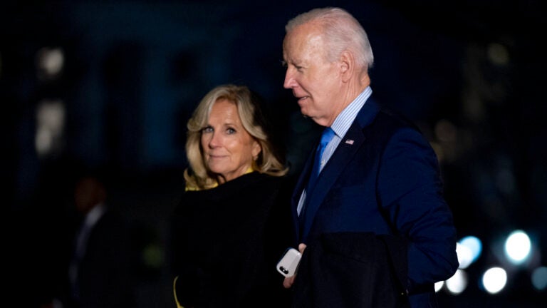 President Joe Biden and first lady Jill Biden arrive at the White House in Washington.
