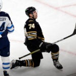 Boston Bruins left wing Jake DeBrusk (74) scores a goal in the third period. The Bruins defeat the Jets, 4-1, at TD Garden.