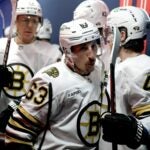 PHILADELPHIA, PENNSYLVANIA - JANUARY 27: Brad Marchand #63 of the Boston Bruins takes the ice with teammates before playing against the Philadelphia Flyers at the Wells Fargo Center on January 27, 2024 in Philadelphia, Pennsylvania.