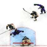 Minnesota forward Kelly Pannek, second from left, and forward Susanna Tapani celebrate a goal by forward Grace Zumwinkle against Montreal.